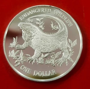 ISLAS CAYMAN. AÑO 1995.ISABEL II. ONE DOLLAR PLATA IGUANA. PESO 28,10 GR - Picture 1 of 2