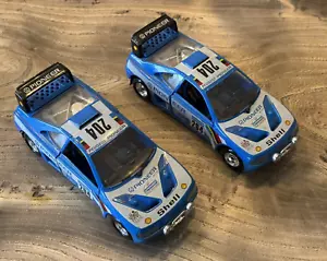 2 x 1/24 Burago Peugeot 405 Turbo 16 Paris Dakar Diecast Modellauto - Bild 1 von 9