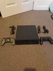 Sony PlayStation 4 1TB Jet Black Console with 2 Controllers