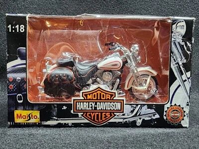 Motocicleta Harley-Davidson Heritage Springer Maisto 1:18 FLSTS Foto 1 de 4