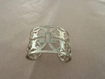 Bracelete de punho com logotipo Tory Burch Miller em ouro - Imagem 1 de 4