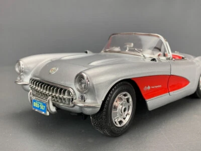 1:18 Bburago Diecast 1957 Corvette Convertible Metallic Silver D0985 - Image 1 of 4
