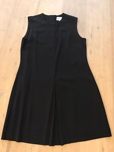 Modèle Courreges Magnifique robe Trapèze Noire marque Bimba Et Lola