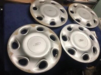 Комплект из четырех 14-дюймовых колпаков колес Ford Escort 1994 1994 подойдет для других нужд - Изображение 1 из 4