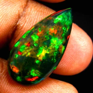 7.15 ct Dazzling Pear Cabochon (23 x 12 mm) Ethiopian Flashing Black Opal - Picture 1 of 2