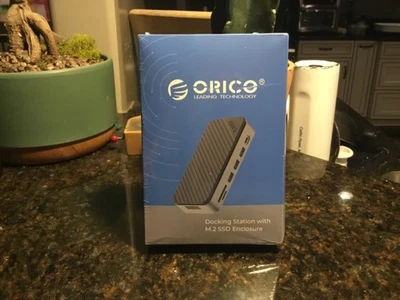 ORICO 10 in 1 USB HUB with M.2 NVMe SATA SSD Enclosure Docking Station-New M2P11 - Image 1 of 4