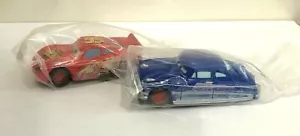 Tyco Lightning McQueen & Doc Hudson Set HO Slot Car con grafica sporca NUOVO - Foto 1 di 4
