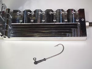 Salzwasser Popeye Jig Form 1/4oz mit Augen 6 Hohlraum Wireline Flunder Striper - Bild 1 von 4