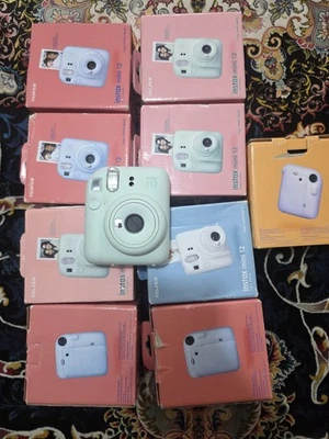 Instax Mini 12 Camera, colour as seen on pictures, hand Strap Manual - Image 1 of 4
