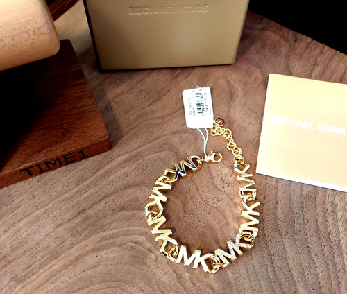 Bracciale catena Michael Kors in ottone con logo