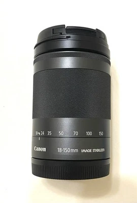 Lente Canon EF-M 18-150 mm f/3,5-6,3 IS STM con tapas Foto 1 de 4