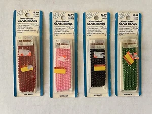 NOS 4 Packs EZ Cross-Locked Glass Beads 1.5 Yards Each Red Pink Black Green - Picture 1 of 2