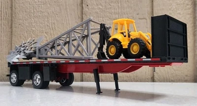 Camionero de larga distancia New-Ray escala 1:32 • Remolque de plataforma plana con retroexcavadora y molino de viento Foto 1 de 4