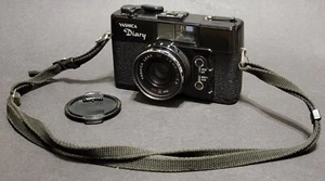 Diario Yashica 1978 vintage 38 mm 1:2,8 con filtro de 46 mm - funciona pero necesita reparación - Imagen 1 de 10