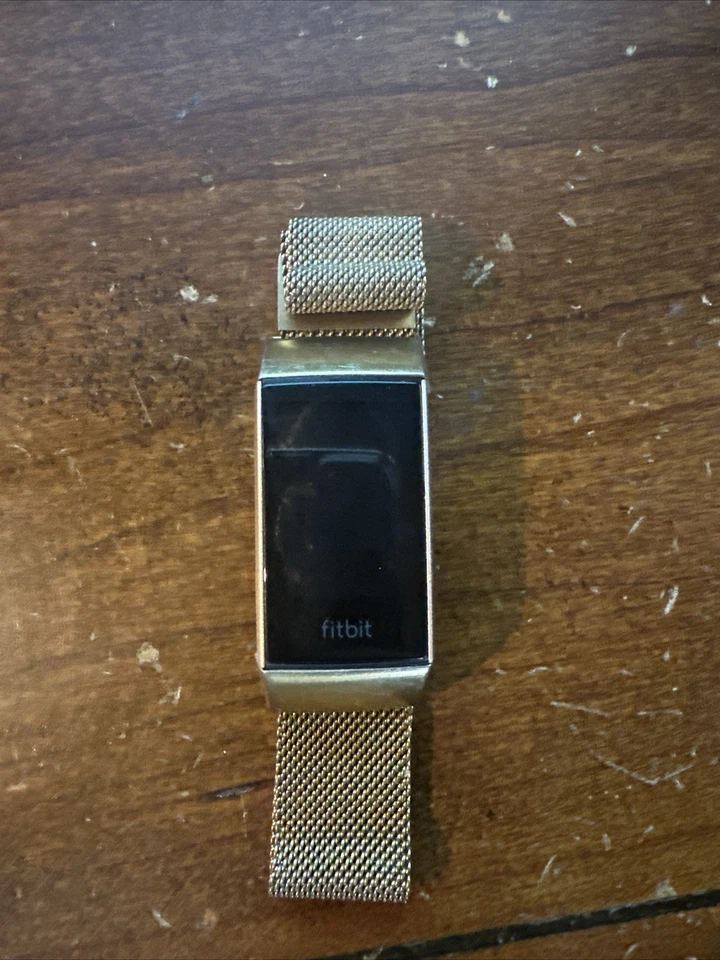 Rastreador de actividad física Fitbit Charge 3 sin cargador banda dorada-HR Foto 1 de 2