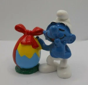 SMURFS SCHLUMPF BARBAPUFFO 20490 EASTER SMURF PUFFO con UOVO SMURF WITH EGG RED - Foto 1 di 1