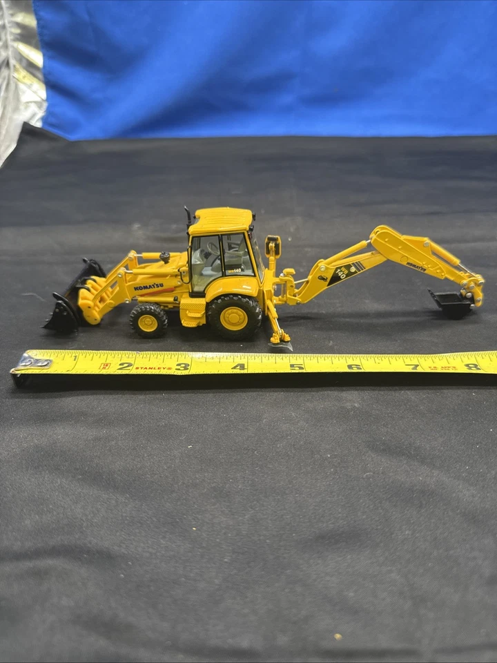 Retroexcavadora cargador tractor Komatsu WB140 de 1ª marcha escala 1:50 A2C Foto 1 de 4