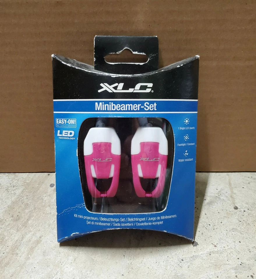 Conjunto XLC Mini Flex One LED frontal/traseiro, branco/rosa - Imagem 1 de 3