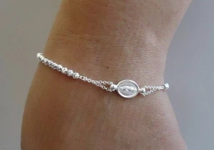 PULSERA RELIGIOSA CON CUENTAS CORTE DIAMANTE CON MEDALLÓN ROSARIO/PLATA DE LEY 925  - Imagen 1 de 1