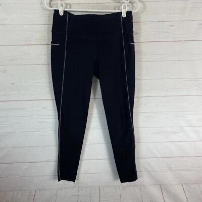 Medias para correr Title Nine by MPG con bolsillo reflectante talla pequeña negras elásticas Foto 1 de 4