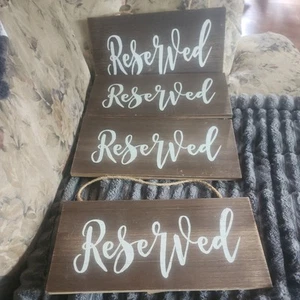 brown wooden sign with white lettering "reserved" approx. 12”x6” - Picture 1 of 6