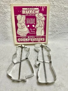 VINTAGE AMISH HOLLÄNDISCHER JUNGE UND MÄDCHEN METALL KOCHSCHNEIDER MIT OVP SET - Bild 1 von 5