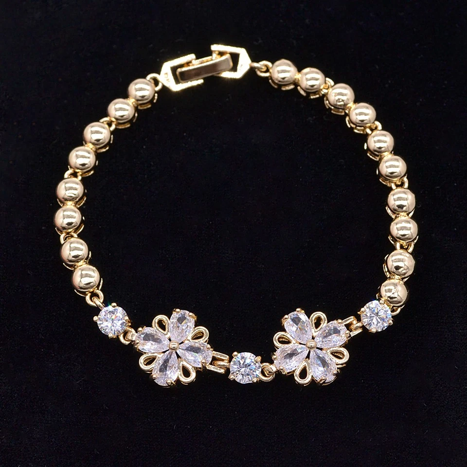 Brazalete con dijes de flores de topacio místico transparente de moda relleno de oro amarillo de 18 quilates para mujer Foto 1 de 1