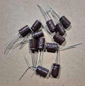 Qty 30 pieces United Chemi-Con Capacitor- 10uF,  100V - Picture 1 of 2