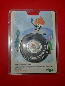 2010 CANADIAN MINT VANCOUVER OLYMPICS MIGA MASCOT 50C COIN+PUCK ICE HOCKEY - Picture 1 of 4