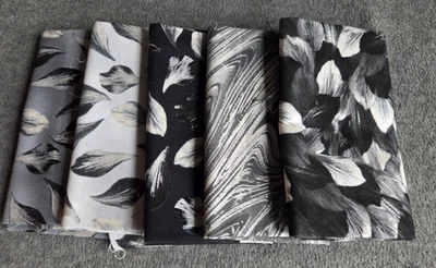 Cuartos de grasa negros/blancos/grises de tela acolchada (5) Foto 1 de 4