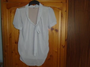 1 top float beige (corpo non visibile), maniche corte trasparenti, taglia Medium, UK 12 - Foto 1 di 3