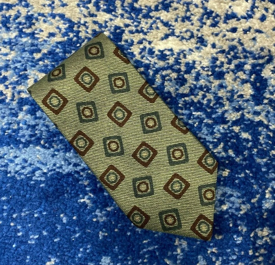 Corbata Coach de seda italiana hecha a mano geométrica verde óxido verde azulado dorada Italia Foto 1 de 4