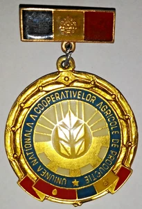 ROMANIA SPILLA PINS DISTINTIVO MEDAGLIA COM UNIONE NAZIONALE COPERATIVE AGRICOLE - Foto 1 di 2
