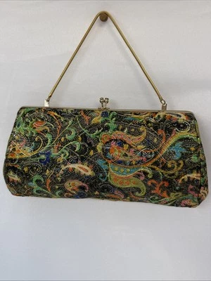 Cartera sin asas metálica multicolor de colección material brocado para damas Foto 1 de 4