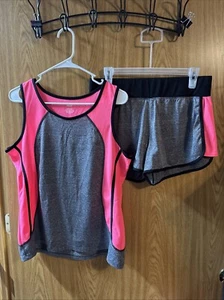 Conjunto de dos piezas de camisa y pantalones cortos sin mangas Zone Pro para mujer talla grande rosa y gris - Imagen 1 de 8