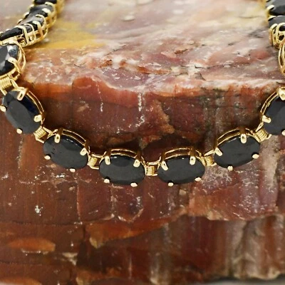 Brazalete tenis oro amarillo 14k zafiro azul oscuro piedras preciosas 6 3/4" largo Foto 1 de 4