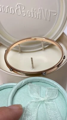 Brazalete Coach C con bisagras de oro rosa Foto 1 de 4