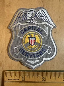 Parche uniforme de servicios capitales - Imagen 1 de 2