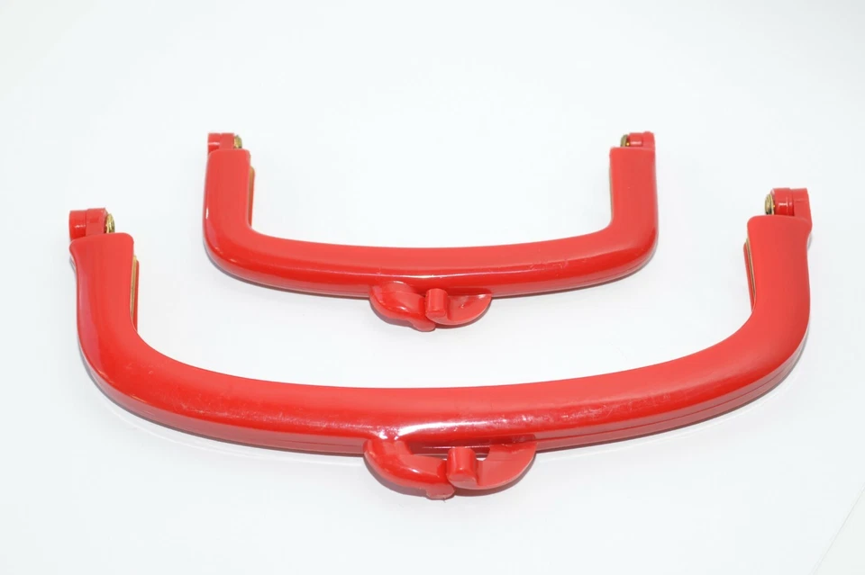 Set Taschen-Rahmen / Taschen-Bügel, 140 x 50 / 215 x 65 mm, Horn-Rot, 80er Jahre - Bild 1 von 1