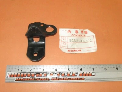 HONDA 72 - 76 CB750 NOS OEM PLACA DE AJUSTE DE BLOQUEO DE ASIENTO 50223-341-000 CB 750 jh Foto 1 de 4