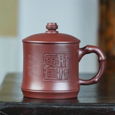 Taza hecha a mano con tapa de mango carácter chino tallada taza de té real Yixing Zisha Foto 1 de 4