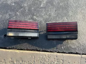 GM 16508352 1988-1994 Pontiac Sunbird 2dr RH & LH Pair Taillight OEM - Picture 1 of 16