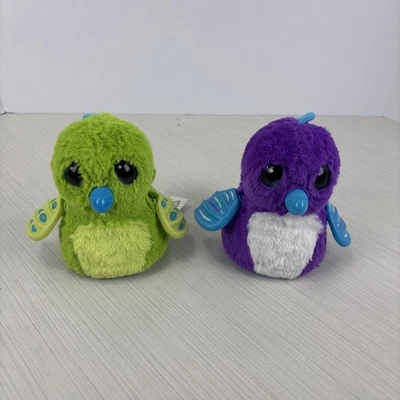 2 интерактивные детские светящиеся глаза и движения Hatchimals Hatchibabies зеленые фиолетовые - Изображение 1 из 4