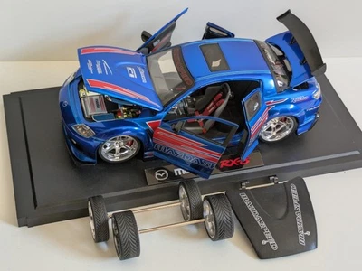 Jada Toys Mazda RX-8 1:18 Import Racer Modellauto mit Zubehör  - Bild 1 von 4