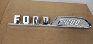 1957 FORD F600 TRUCK RH HOOD EMBLEM - Picture 1 of 6