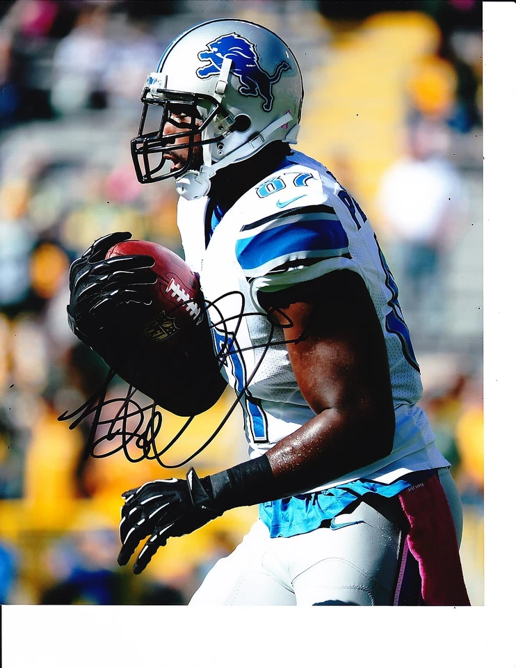 DETROIT LIONS BRANDON PETTIGREW SIGNED RUNNING WITH BALL 8X10 - Image 1 of 1
