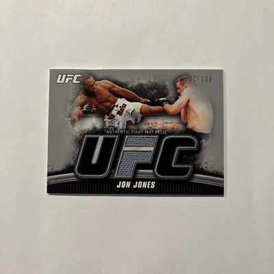2010 TOPPS UFC KNOCKOUT JON JONES MAT RELIC Silver #’d 032/188 - Image 1 of 2