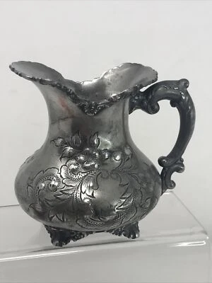 Crema de leche garantizada vintage Aurora 0293 con mango y patas grabada Foto 1 de 4