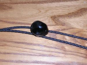 Vtg black leather cord bolo with black stones & silver tone trim - Picture 1 of 4