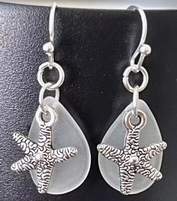 Etch Silver Starfish and Frosty White Faux Sea Glass Earrings. - Image 1 of 3